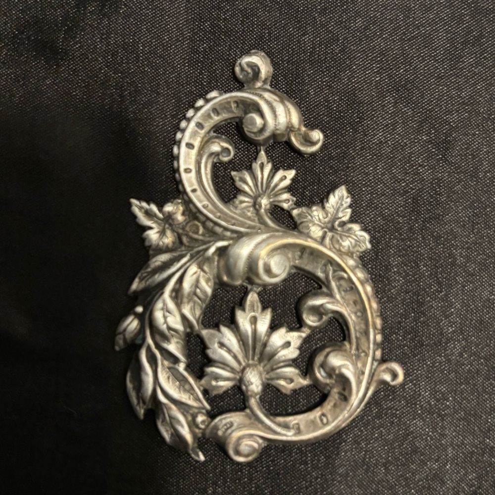 Elegant Silver Brooch with Floral Design